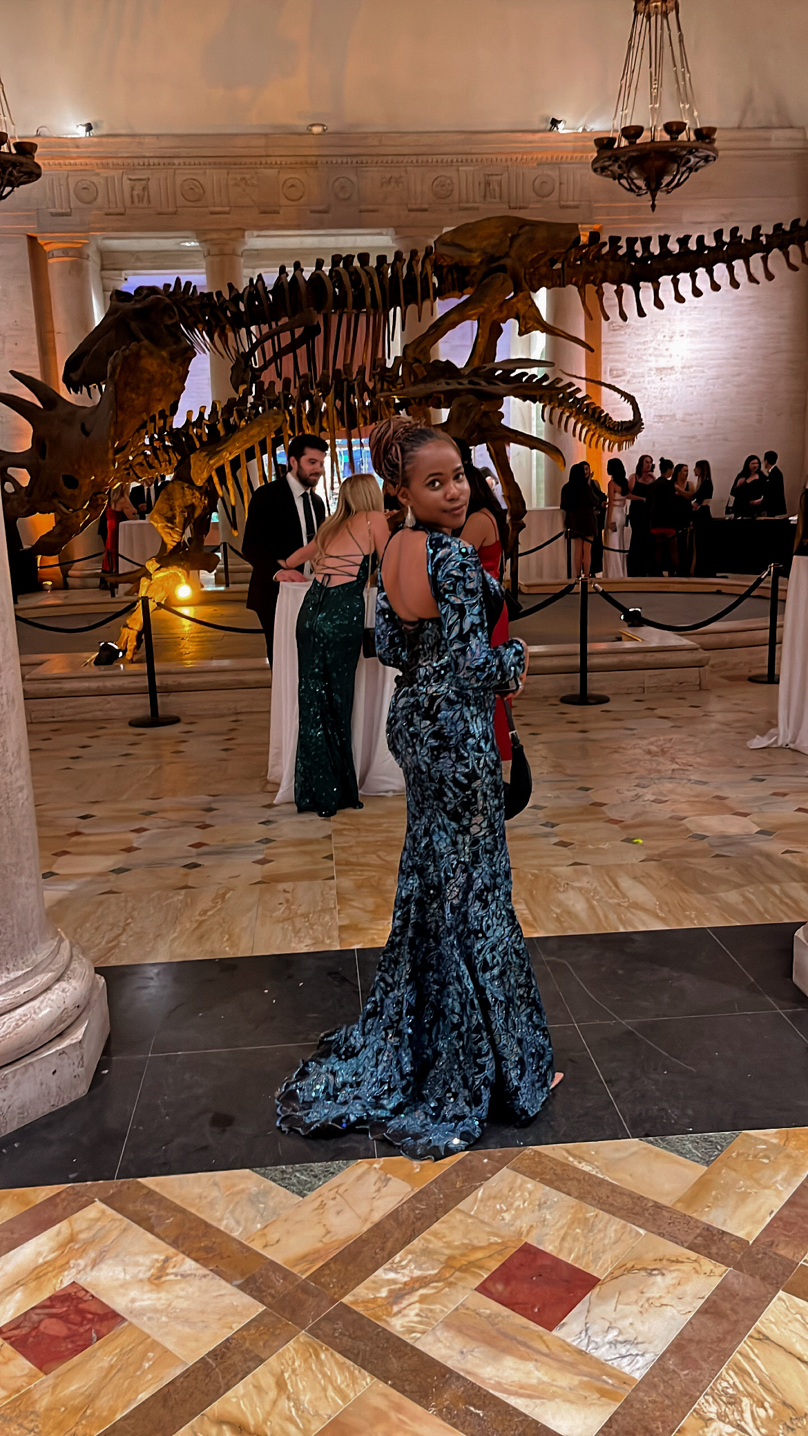 A camera flash going off at a red carpet event